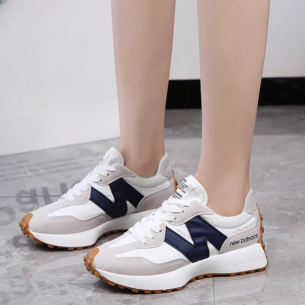 NEW BALANCE WOMAN ®